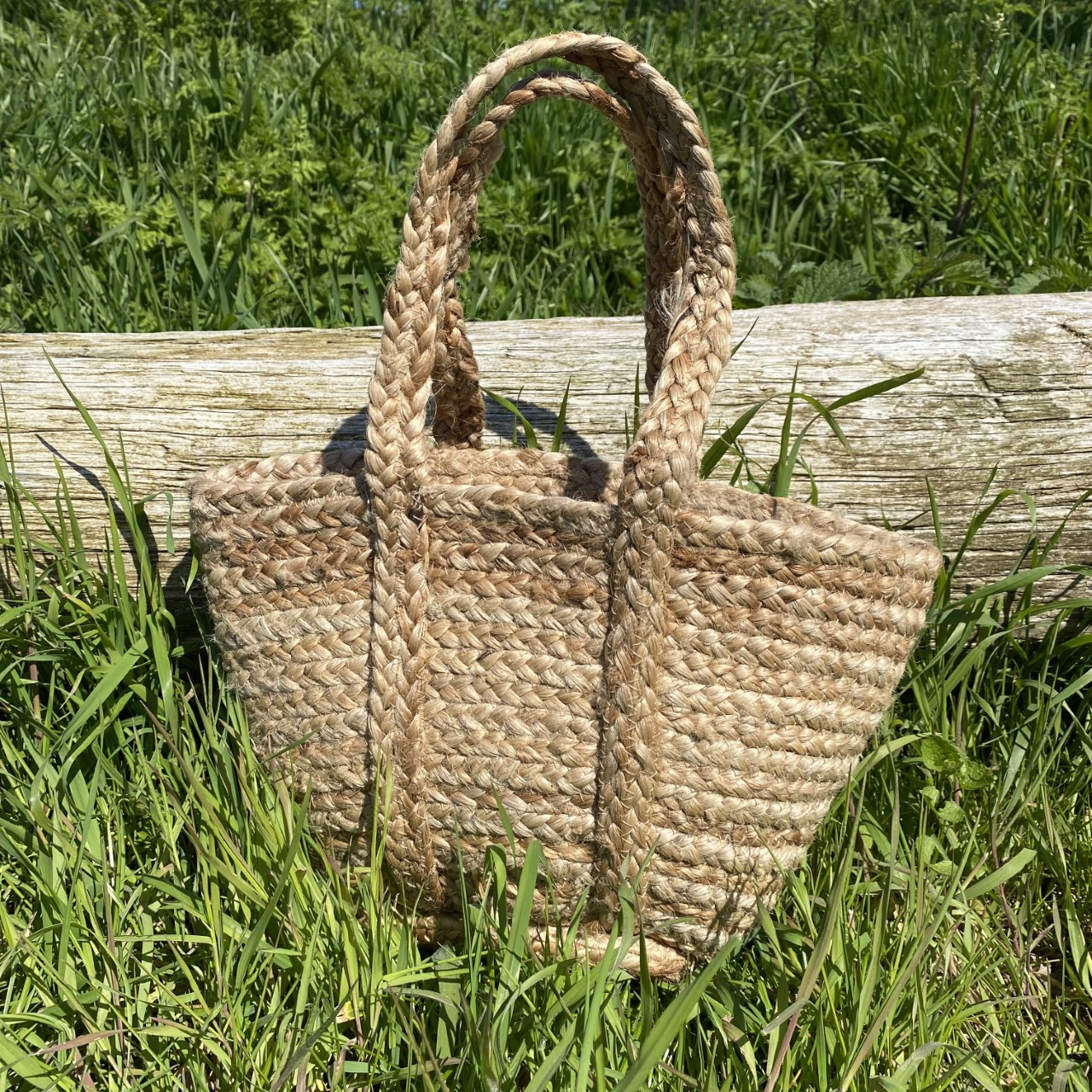 Small natural jute bag with handles